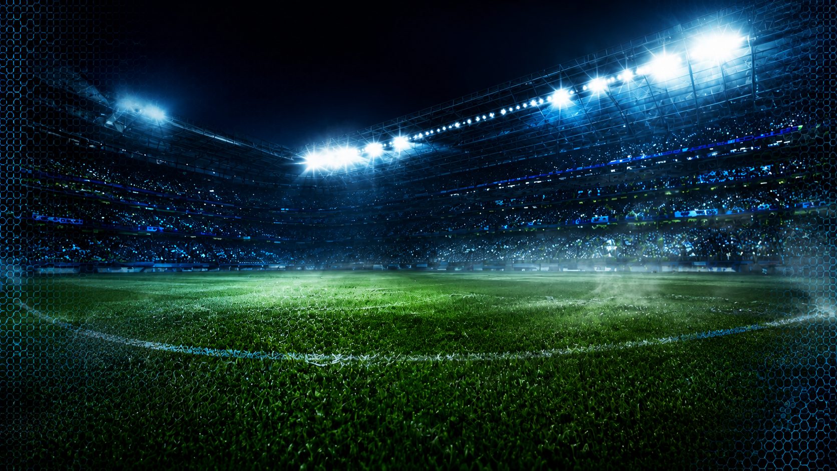 Estadio de fútbol de noche